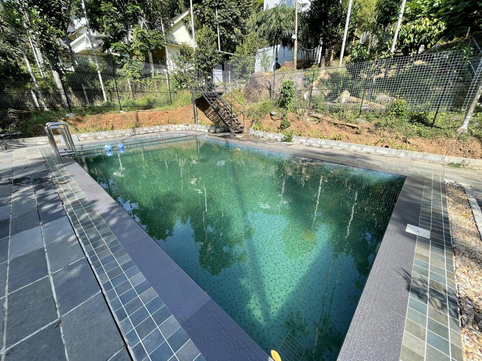 Wetlands Wayanad Pool Resort With Natural Waterfalls Padinjarathara Buitenkant foto